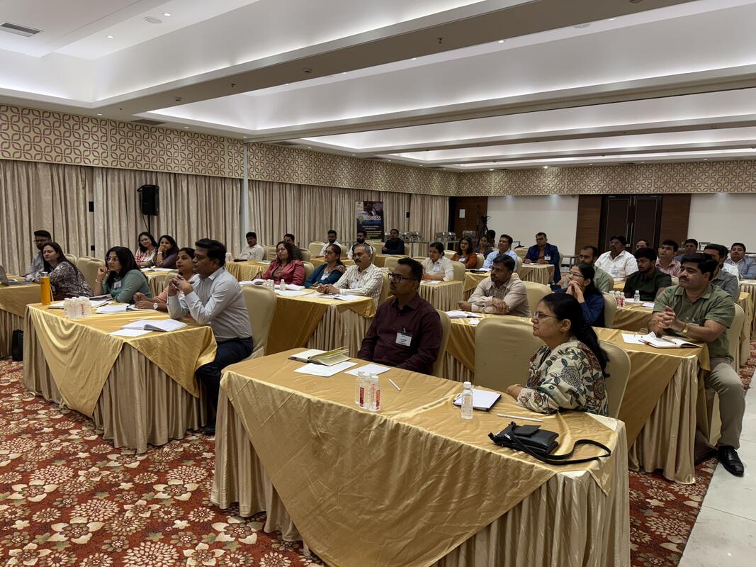 Entrepreneurs engaged in a business excellence session